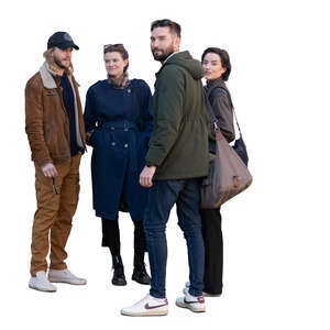 group of four people standing outside