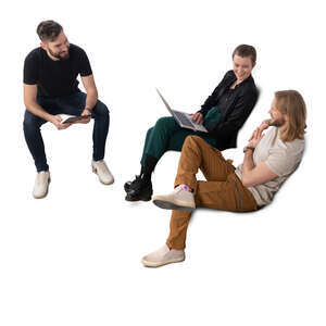 three people sitting and discussing work things