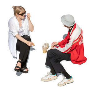 two people sitting and eating lunch seen from above