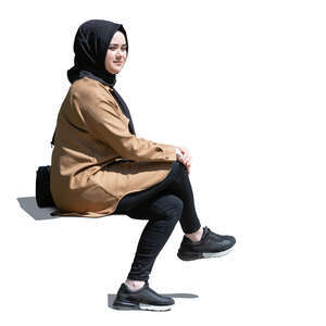 muslim woman with hijab sitting