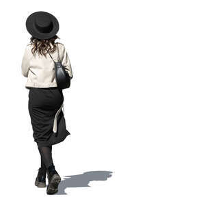 woman with a black hat walking