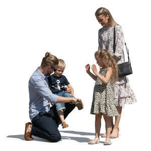 family with kids standing