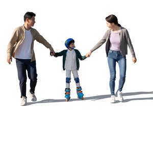 asian boy roller skating with his parents