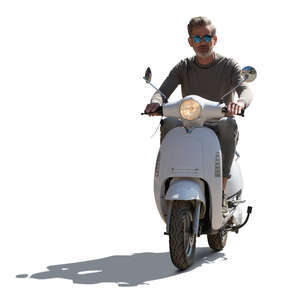backlit man riding a white motor scooter