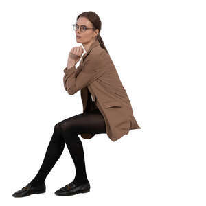 woman sitting and leaning on a table