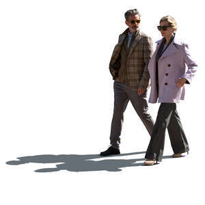 backlit man and woman in spring walking together