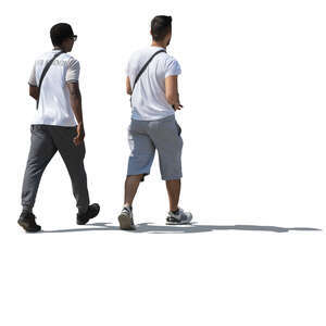 two sidelit men walking