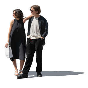 man and woman standing and looking in one direction