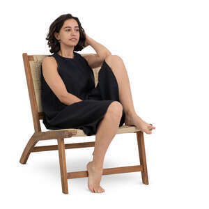 woman in a black dress sitting