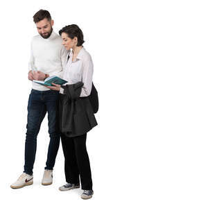 man and woman standing and reading a book