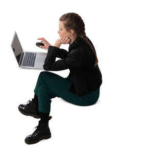 woman sitting at a desk and working seen from above