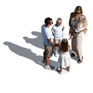 family with many kids standing outside in summer