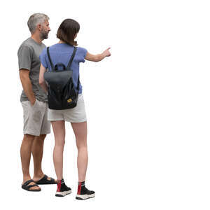 man and woman standing and selecting smth on touch screen