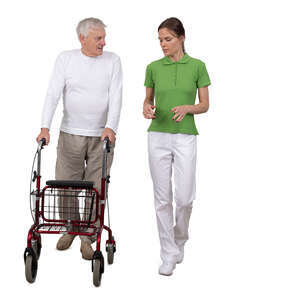 elderly man with a walking frame talking to a medical worker