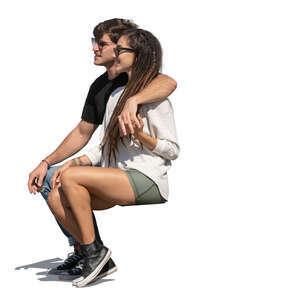south american coule sitting together outside