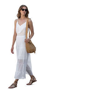woman in a white summer dress walking