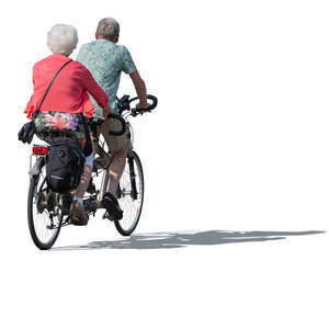 elderly couple riding a tandem bike