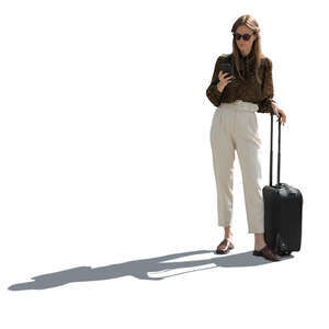 backlit woman with a suitcase standing