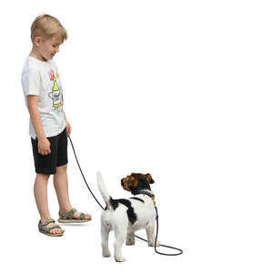 little boy with a dog standing