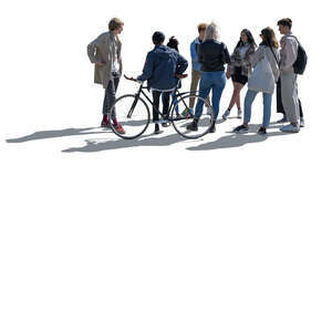 backlit group of teenagers standing