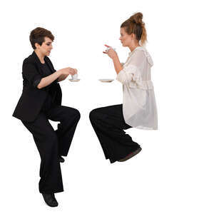 women sitting in a coffee bar and talking