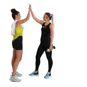 two cut out women in gym greeting each other with high five