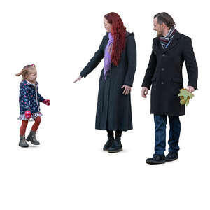 family with a little daughter picking leaves in the park