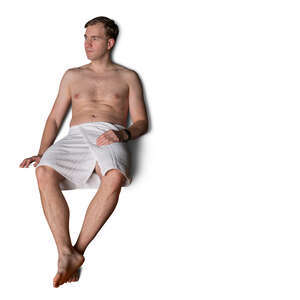 man sitting in a sauna