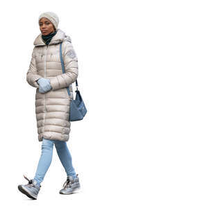 black woman wearing beige winter jacket walking