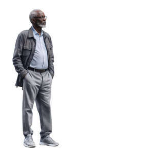 grey haired black man standing