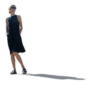 woman in a black dress standing seen from low close angle