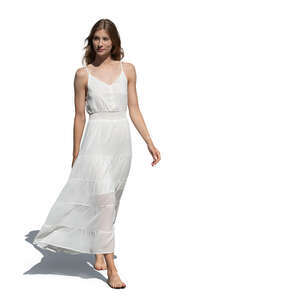 woman in a white dress walking barefoot