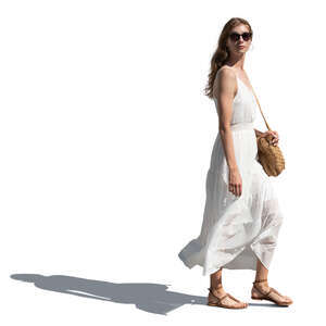 woman in a white summer dress walking