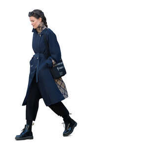 woman with a dark blue overcoat walking