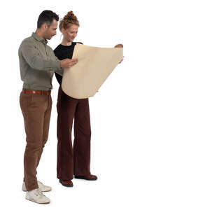 man and woman standing and looking at drawings