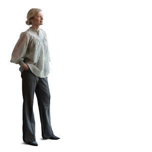cut out middle aged woman standing by the glass door and looking out