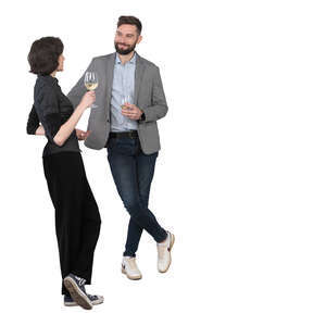 man and woman at a bar talking and drinking wine