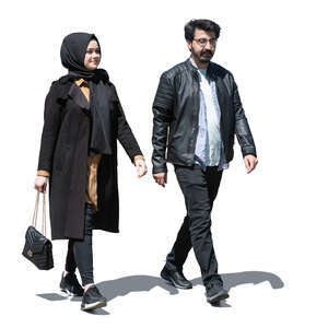 middle eastern man and woman walking