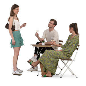 woman talking to her friends sitting in a restaurant