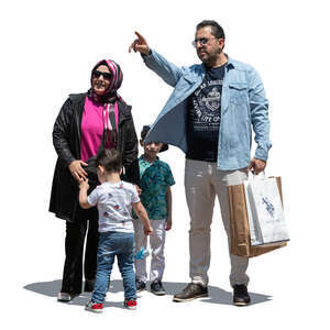 cut out middle eastern family standing and looking in one direction