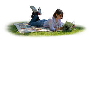 cut out woman lying in tree shade and reading a book