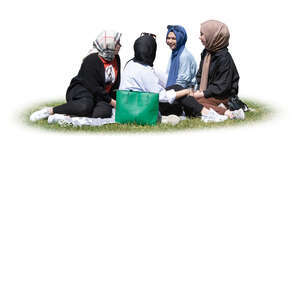 cut out group of muslim girls sitting in the park