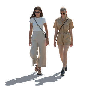 two cut out backlit women walking