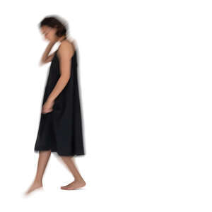 cut out motion blur image of a woman in a black dress walking down the stairs