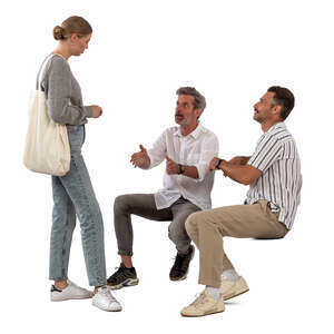 cut out woman standing and talking to two men sitting