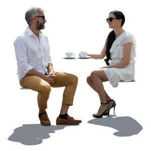 cut out backlit man and woman sitting in a restaurant