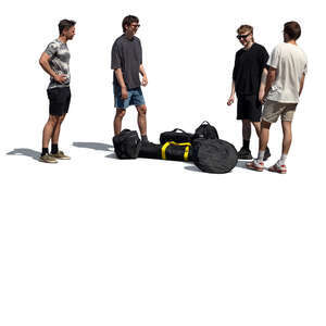 four young men with many bags standing