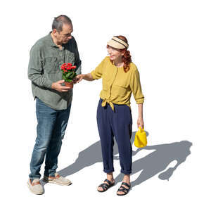 top view of an elderly couple planting flowers