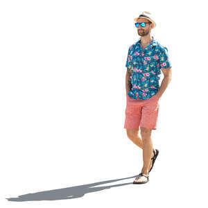 cut out backlit man with a hat walking in summer
