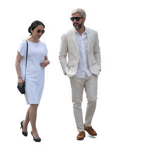 man and woman in posh white clothing walking